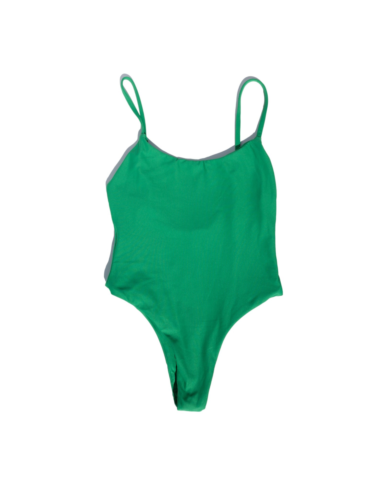 front of Nellie one piece in High Tropic