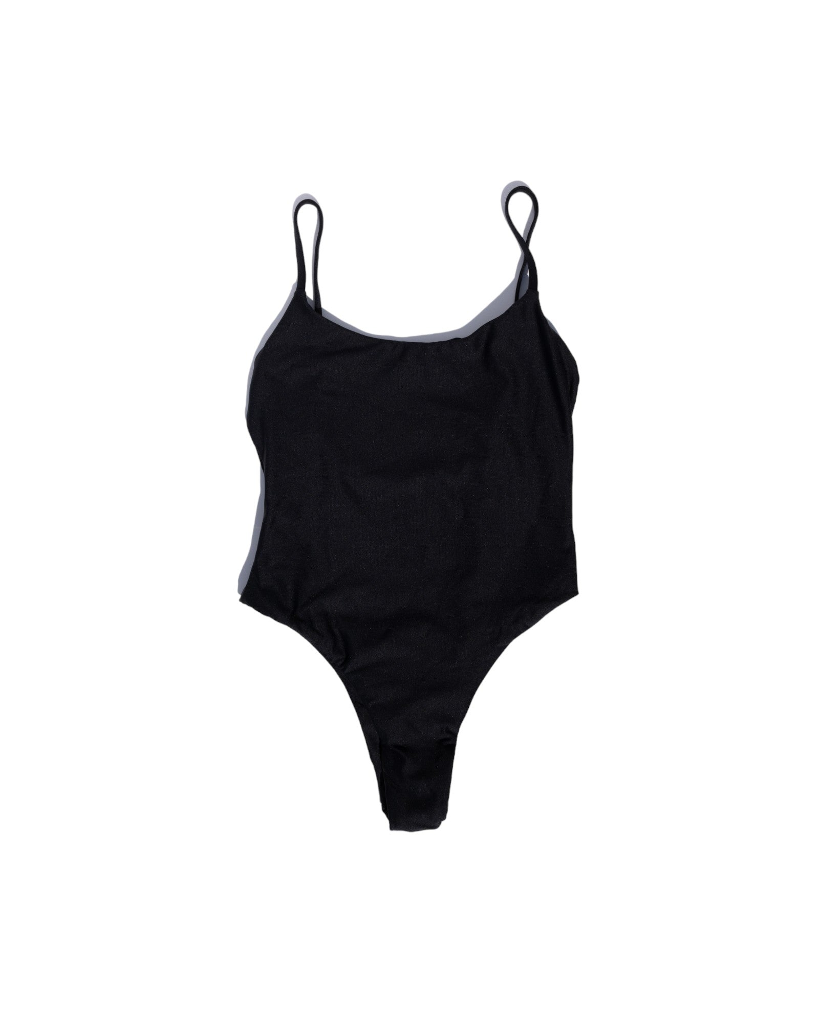 front of Nellie one piece in Black Sands